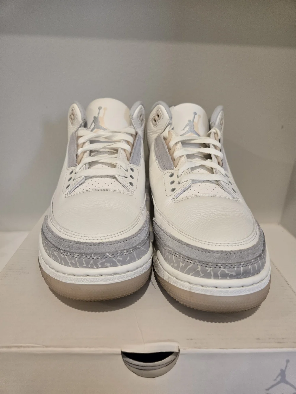 Jordan 3 Retro Craft Ivory sneakers, featuring a white leather upper
